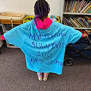 Summer is registered to the contest to win money with this photo: back_view, bookshelf, braided_hair, carpet, celebration, child, classroom, colorful, educational, hoodie, indoor, playful, purple_hair, school, sneakers, student, text_on_clothing, tshirt, whiteboard, writing