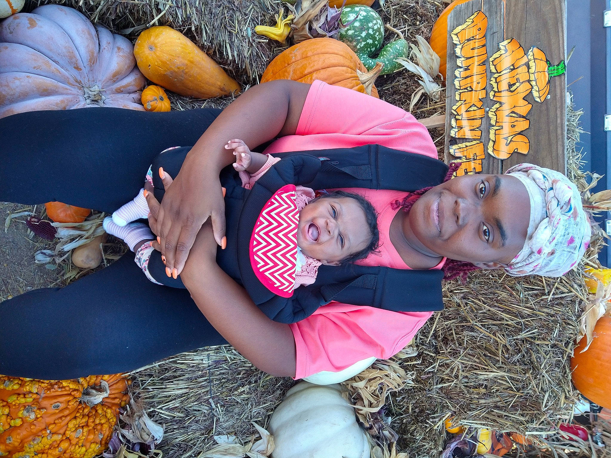 Jazlynn joined the competition — help win amazing prizes! child, event, eyewear, fun, grass, happy, hat, headwear, human_leg, joy, leisure, pattern, person, plant, recreation, sandal, sitting, spring, sunglasses, textile