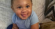 Prince joined the competition — help win amazing prizes! toddler, child, smiling, tongue_out, blue_shirt, navy_pants, pigtails, couch, pillows, indoor, happy, cute, baby, person, seated, homedecor, skin, face, hand, footwear