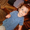 toddler, child, denim_dress, blue_eyes, curly_hair, balloon, wooden_floor, indoor, person, feet, legs, footwear, casual, standing, curious, portrait, light, hand, smile, background