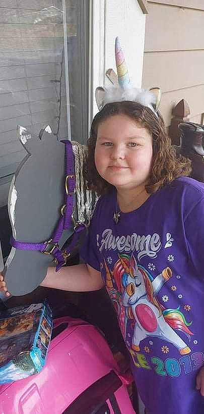 Baylee joined the competition — help win amazing prizes! child, cool, electric_blue, event, facial_expression, fun, hairstyle, happy, head, joy, leisure, long_hair, magenta, necklace, person, pink, purple, sitting, sleeve, smile