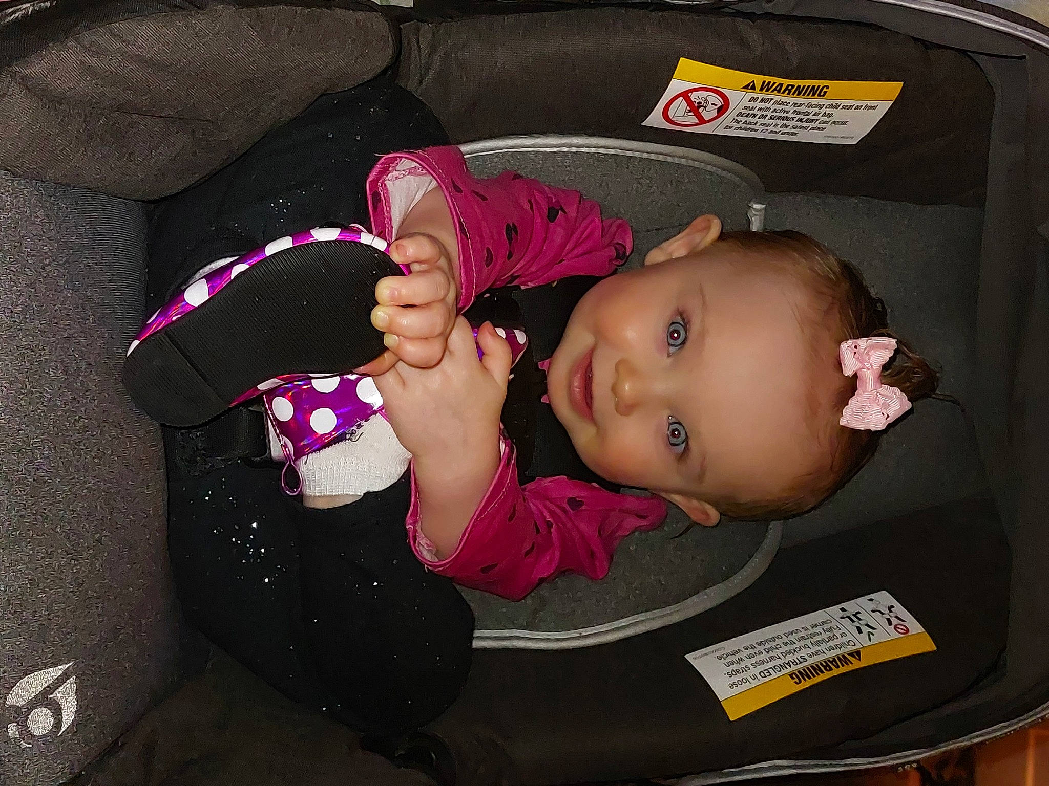 River is registered to the contest to win money with this photo: baby, baby_carriage, baby_products, baby_toddler_clothing, car_seat, cheek, child, clothing, comfort, eye, eyelash, facial_expression, fashion_accessory, finger, hairstyle, joy, mouth, person, pink, skin