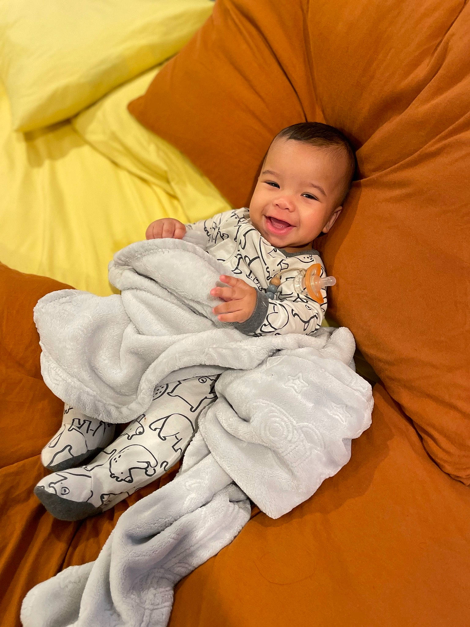 Memphis joined the competition — help win amazing prizes! baby, baby_toddler_clothing, barefoot, child, comfort, flooring, foot, happy, human_leg, joy, knee, lap, linens, person, sitting, skin, sleeve, smile, sock, textile