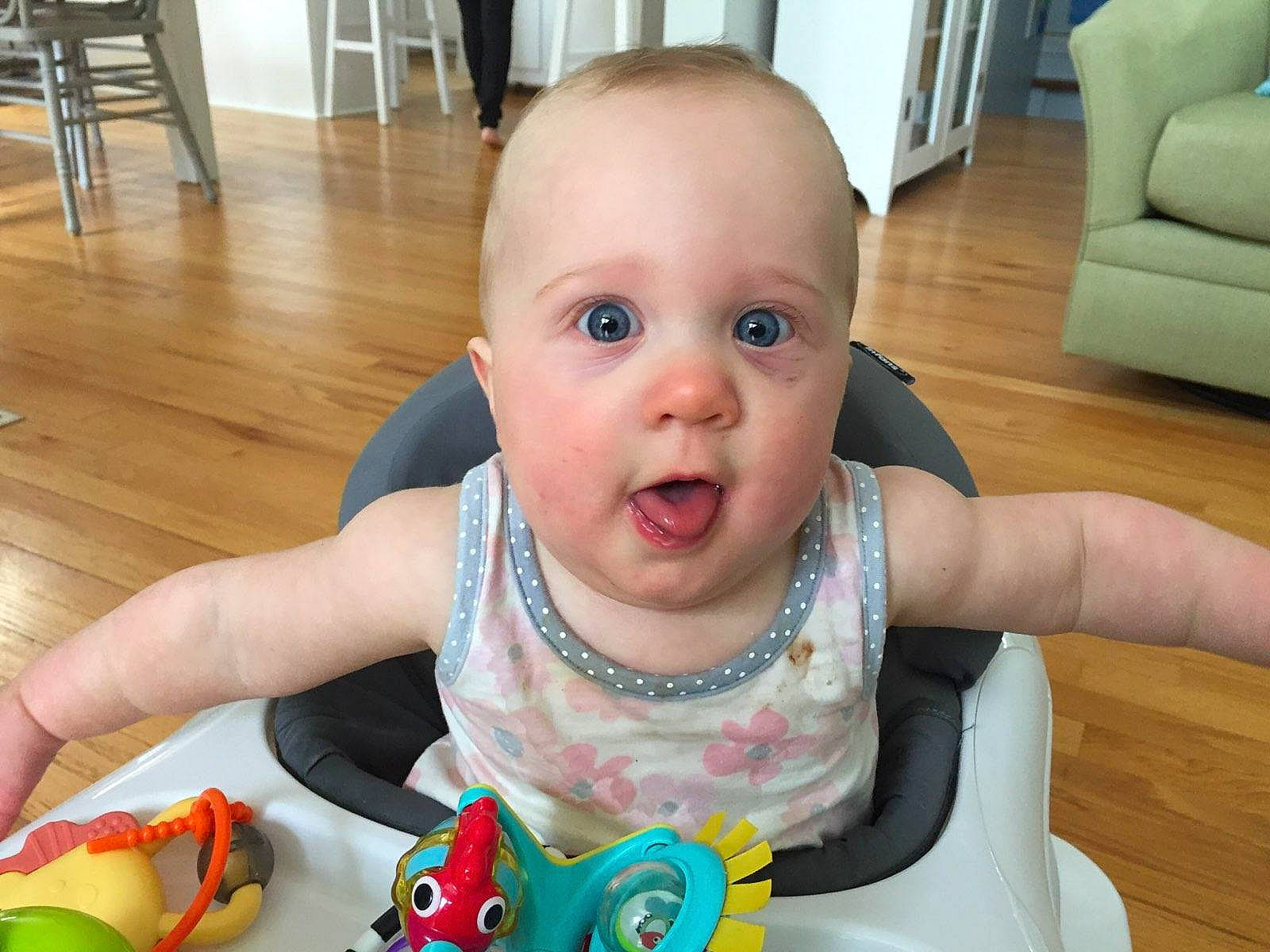 Brinley joined the competition — help win amazing prizes! baby, baby_playing_with_toys, cheek, child, eating, eye, face, finger, food, head, mouth, nose, person, play, skin, smile, surprise, toddler, toy, tummy_time