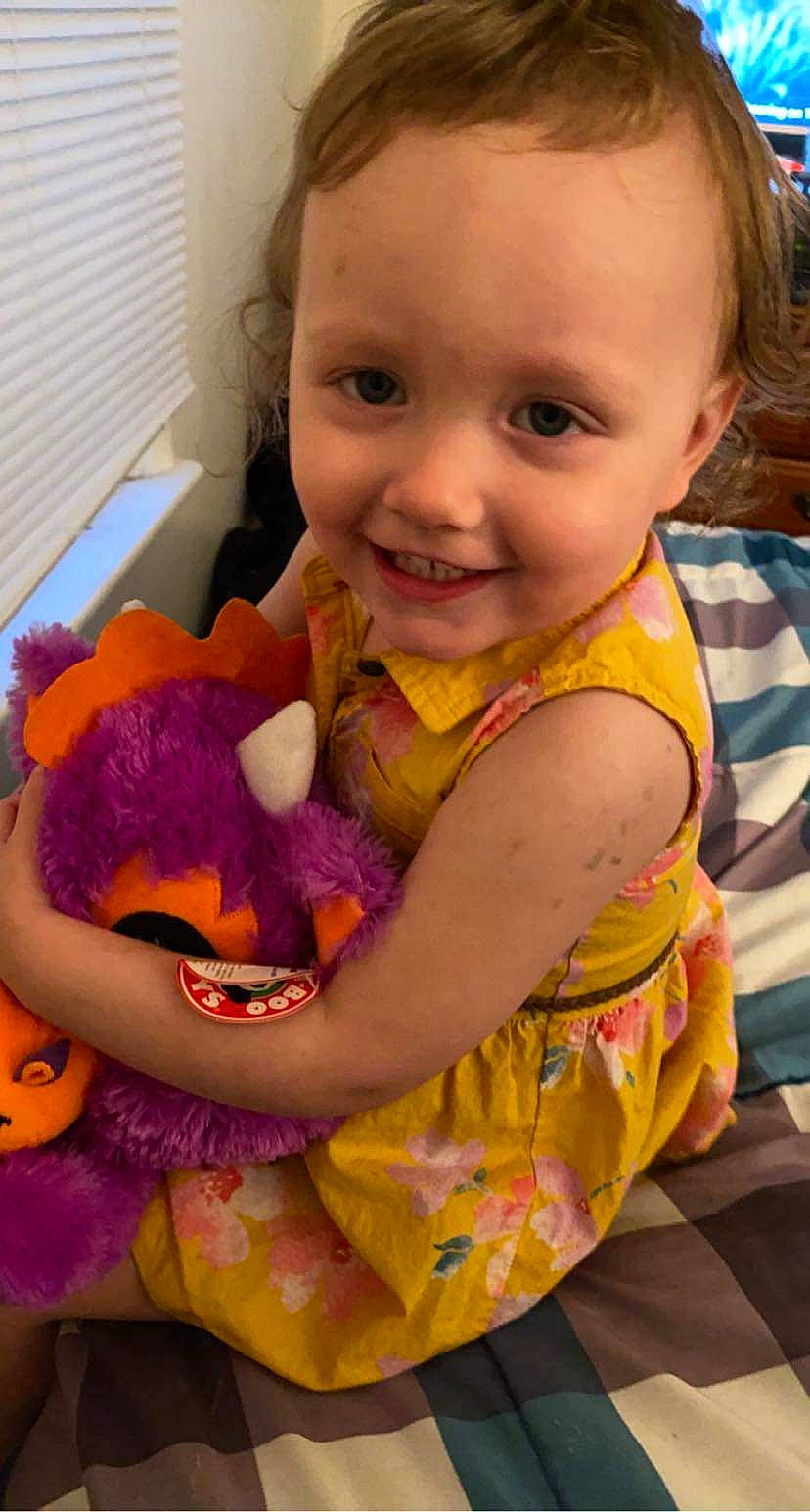 Ivory is registered to the contest to win money with this photo: arm, baby, baby_products, baby_toddler_clothing, cheek, child, eye, finger, fun, hand, happy, head, iris, joy, mouth, person, pink, purple, smile, toddler