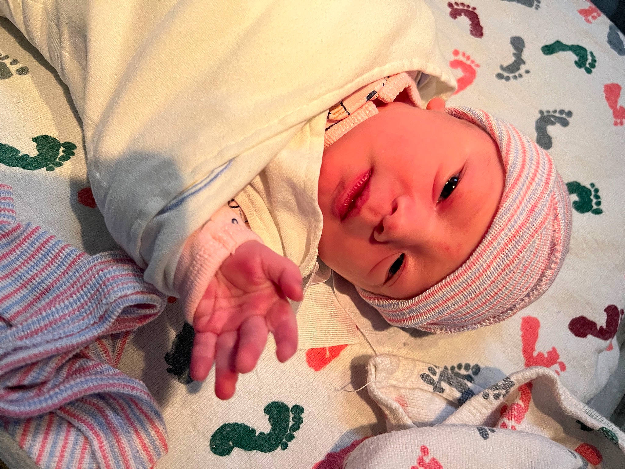 Jane is registered to the contest to win money with this photo: arm, art, baby, baby_sleeping, baby_toddler_clothing, cheek, child, comfort, eye, eyelash, finger, hand, head, headwear, linens, mouth, pattern, person, skin, sleeve