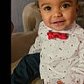 Qassim participe au concours pour gagner de l'argent avec cette photo : baby, casual, chair, child, clothing, curly_hair, cute, face, fashion, happy, home, indoor, person, portrait, red_bow_tie, sitting, smiling, toddler, white_shirt, young_child