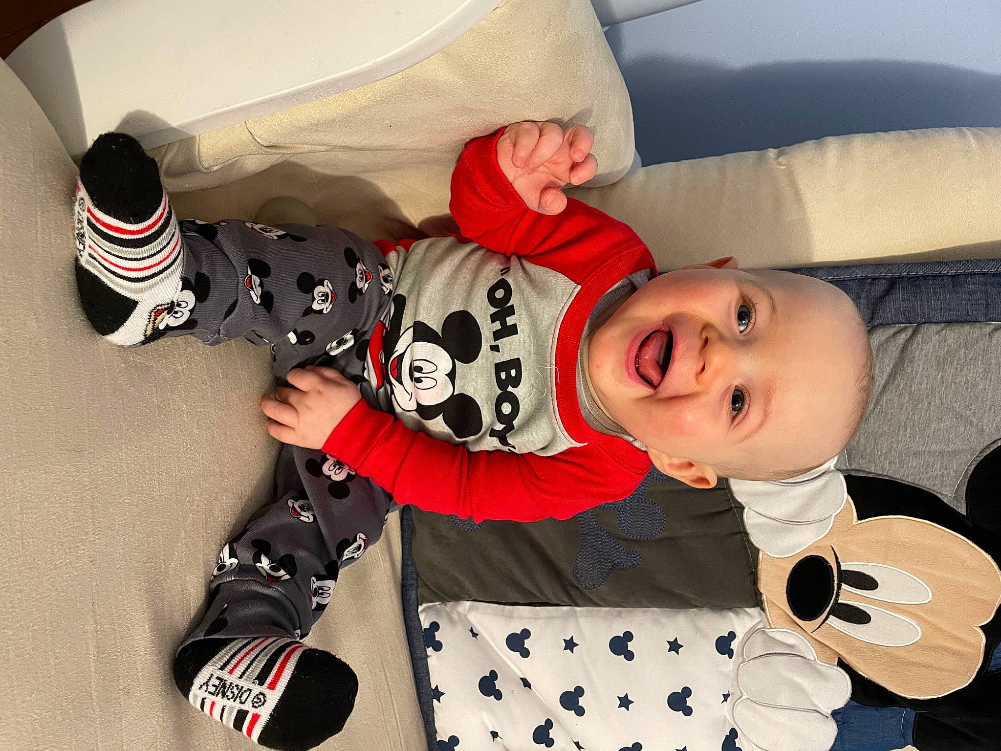 Jeremy is registered to the contest to win money with this photo: baby, baby_toddler_clothing, black, carmine, child, comfort, facial_expression, fun, happy, hat, mammal, organ, pattern, person, product, sleeve, smile, textile, toddler, vertebrate