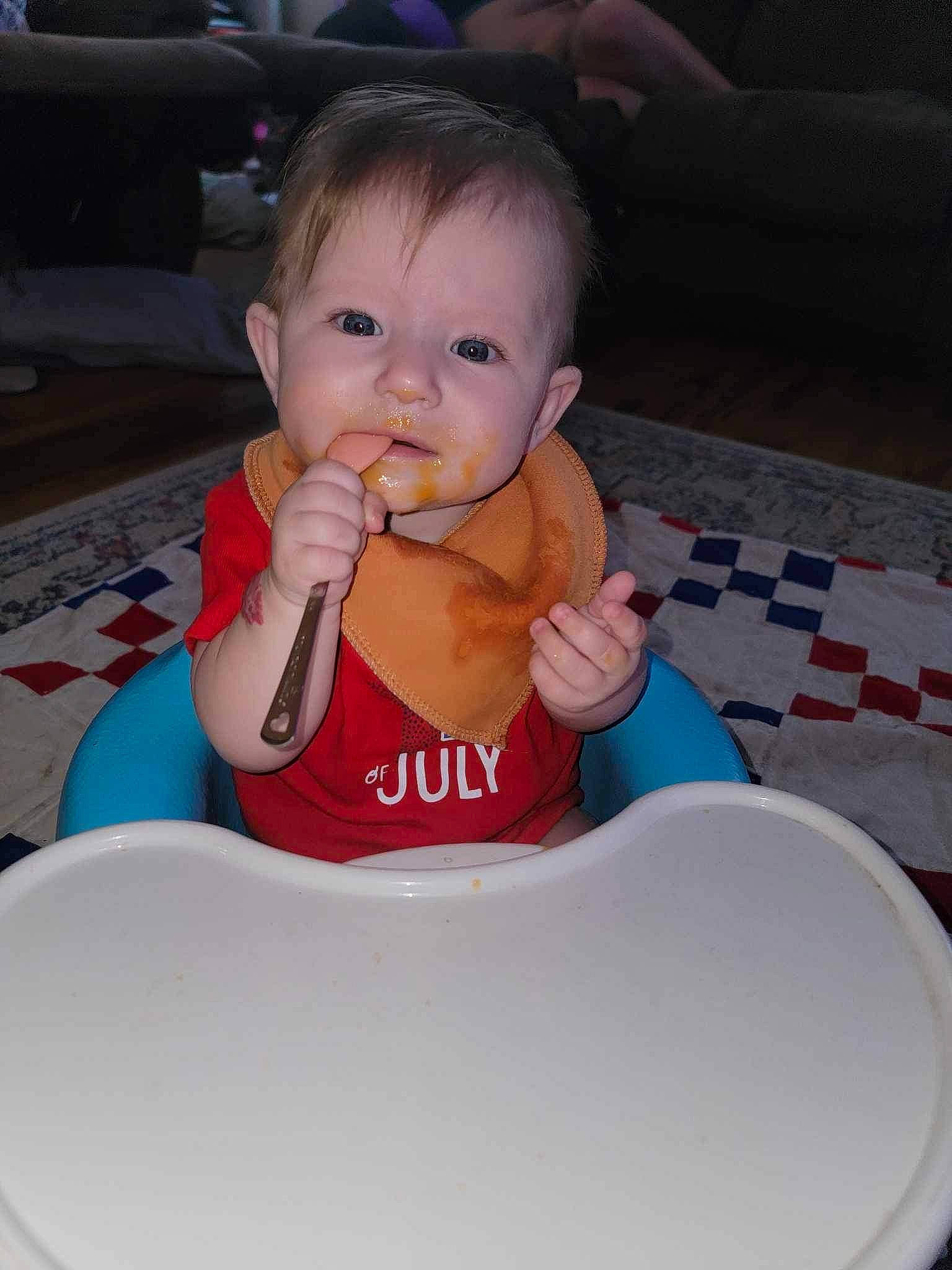 Wren joined the competition — help win amazing prizes! arm, baby, baby_products, baby_toddler_clothing, chair, cheek, child, flooring, fun, hair, hand, head, mouth, nail, person, recreation, sitting, skin, table, thumb