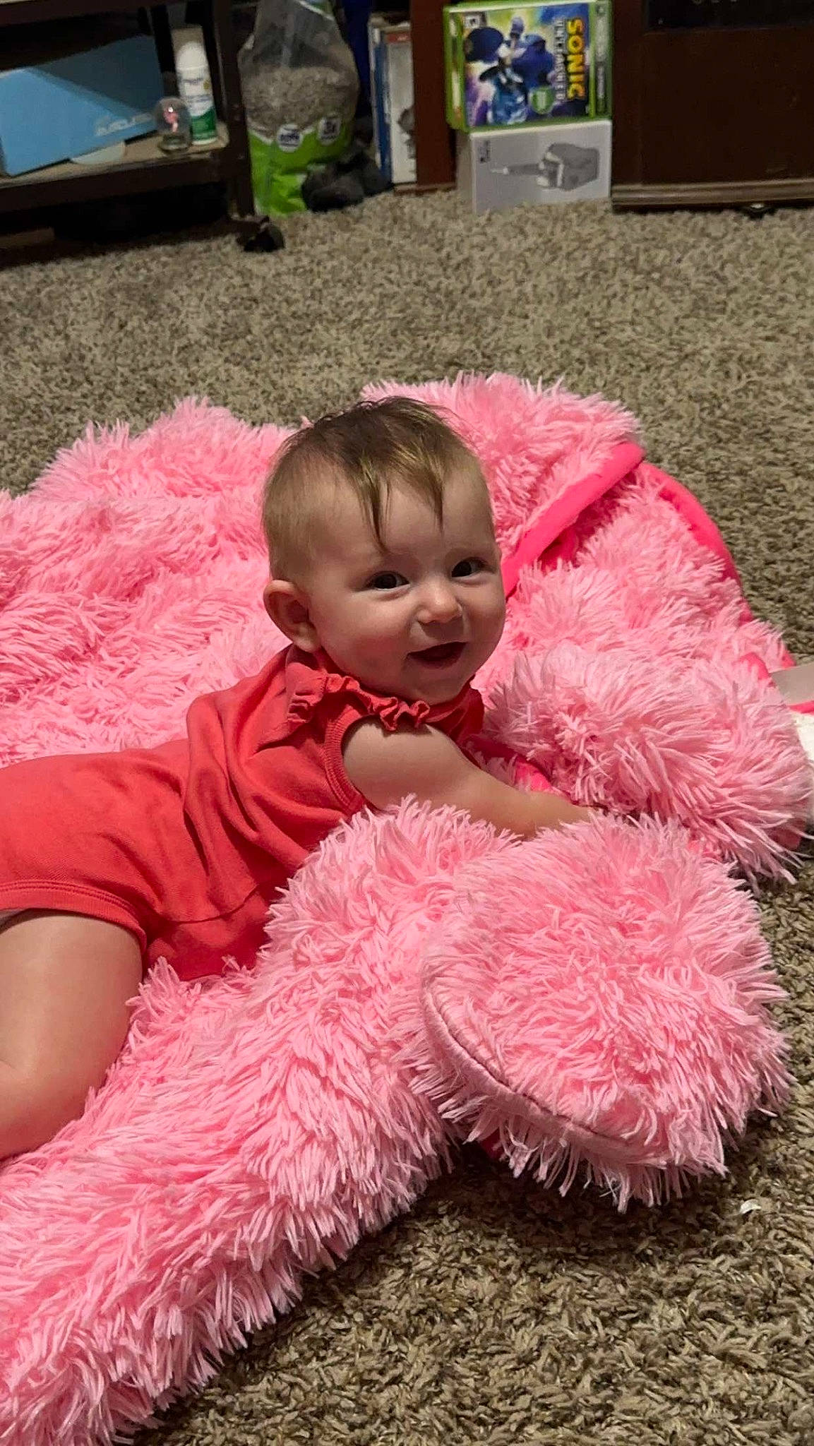 Wren joined the competition — help win amazing prizes! baby, baby_toddler_clothing, child, comfort, flooring, fun, fur, grass, magenta, mammal, person, pink, sitting, skin, smile, stuffed_toy, teddy_bear, textile, toddler, toy