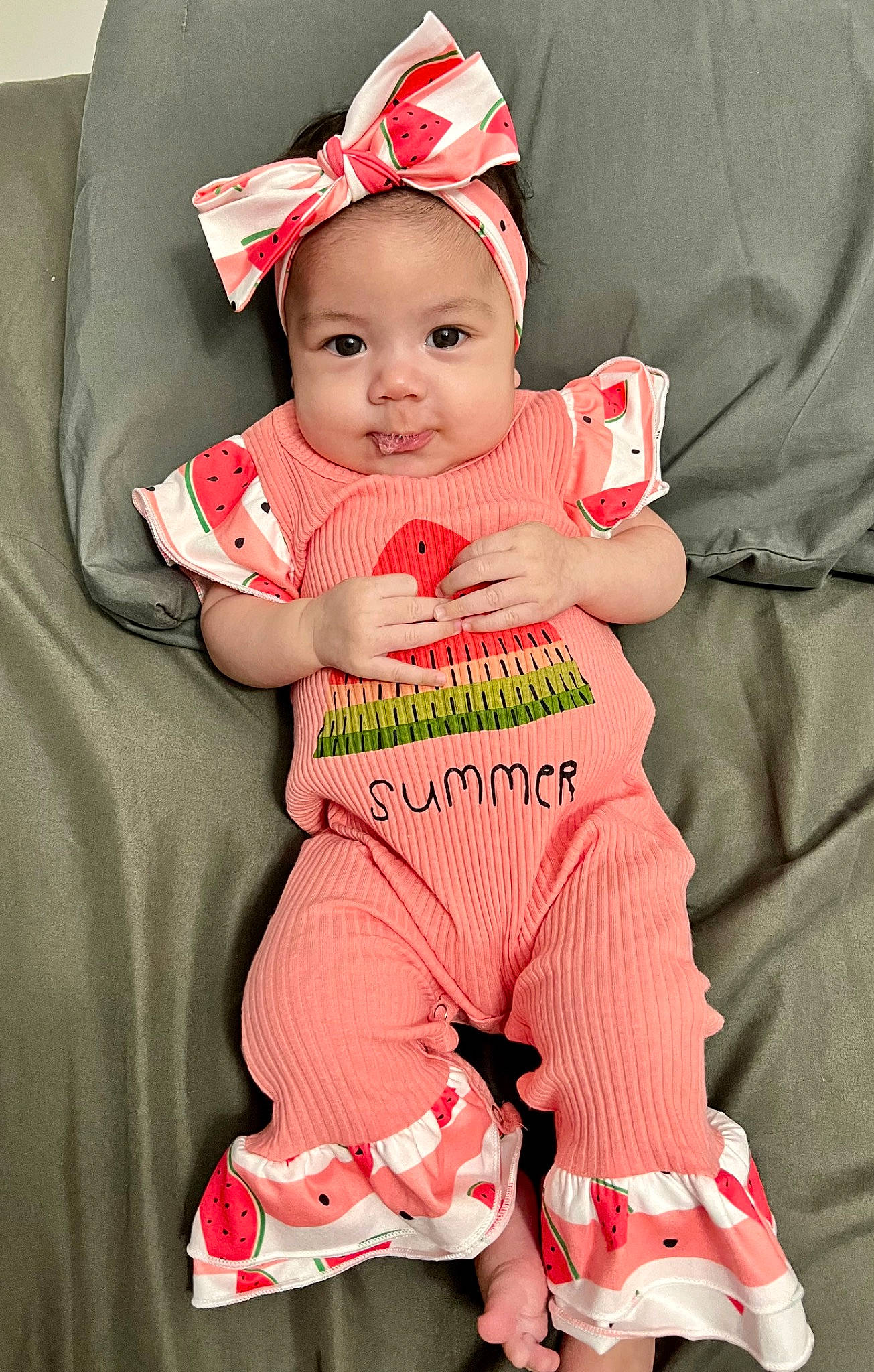 Faith is registered to the contest to win money with this photo: baby, baby_carriage, baby_products, baby_toddler_clothing, cap, cheek, child, comfort, costume_hat, face, happy, hat, lap, linens, person, pink, sleeve, sock, t_shirt, toddler