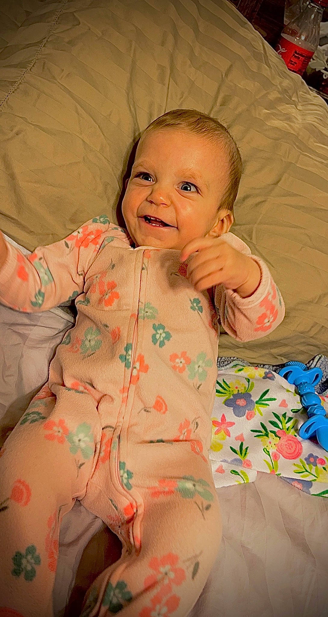 Orianna is registered to the contest to win money with this photo: baby, baby_toddler_clothing, cheek, chest, child, comfort, face, finger, happy, head, joy, linens, mouth, person, skin, sleeve, smile, stomach, textile, thumb