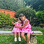 child, children, sisters, girl, toddler, matching_dresses, pink_dress, bench, garden, greenery, brick_wall, plants, flowers, outdoor, grass, shoes, embrace, cute, portrait, summer
