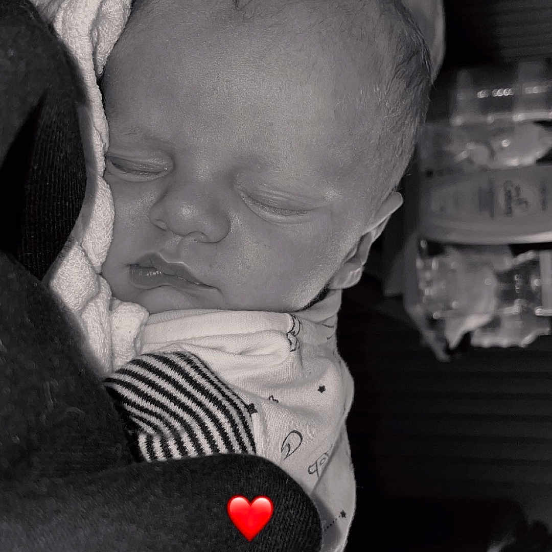 Ayden participe au concours pour gagner de l'argent avec cette photo : baby, black_and_white, blanket, closeup, clothing, cozy, cute, face, head, heart_emoji, indoors, infant, newborn, peaceful, portrait, resting, sleeping, soft, toddler, wrapped