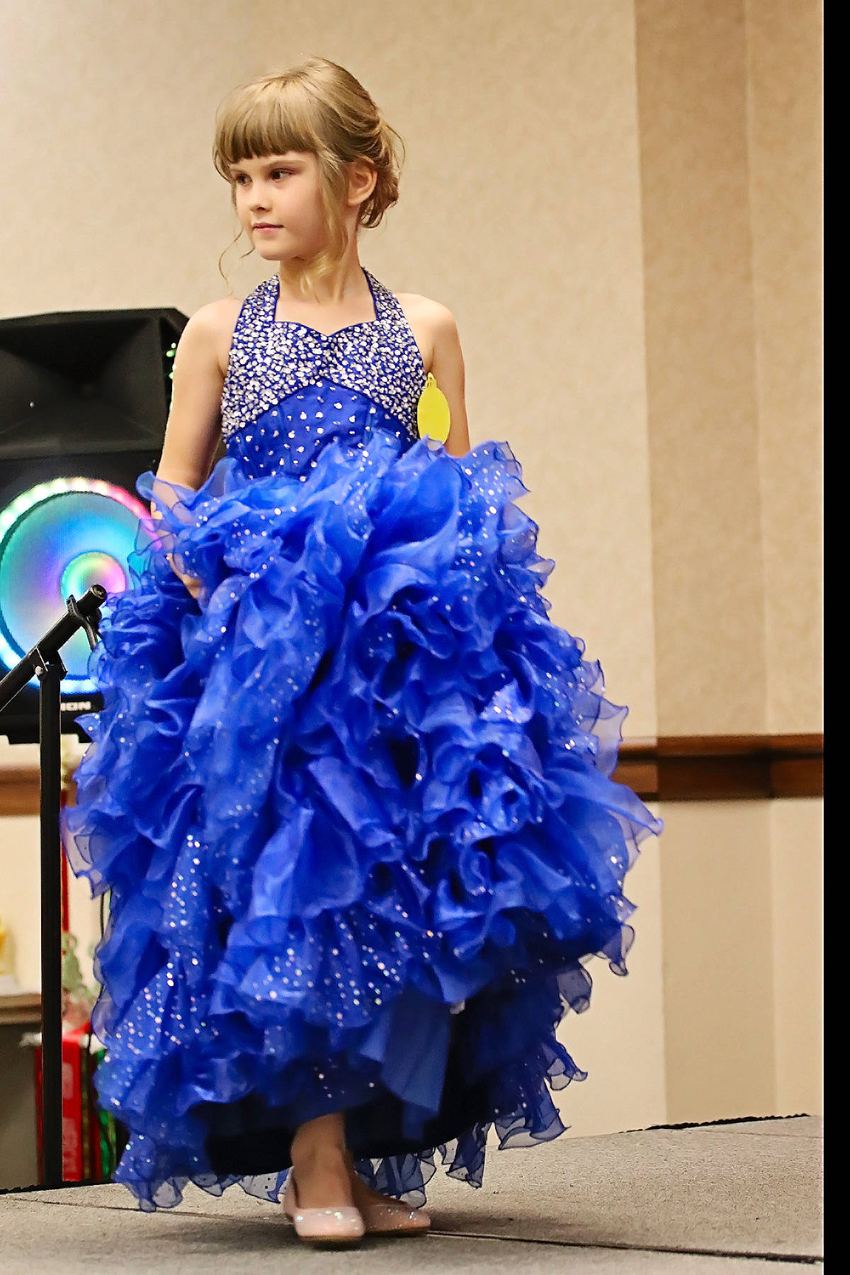 Alayna joined the competition — help win amazing prizes! blue, bridal_party_dress, clothing, cobalt_blue, costume_design, day_dress, dress, electric_blue, embellishment, fashion, fashion_design, gown, haute_couture, high_heels, model, one_piece_garment, person, ruffle, sandal, shoe