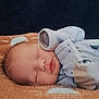 Stevie joined the competition — help win amazing prizes! baby, blanket, blue_clothing, child, closed_eyes, cozy, cute, face, indoor, infant, infant_sleep, newborn, onesie, orange_blanket, peaceful, portrait, resting, serene, sleeping, soft_texture