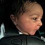 baby, child, car_seat, safety_harness, infant, face, profile, head, hair, closeup, seatbelt, child_seat, restraint, young, newborn, skin, indoors, person, cute, portrait