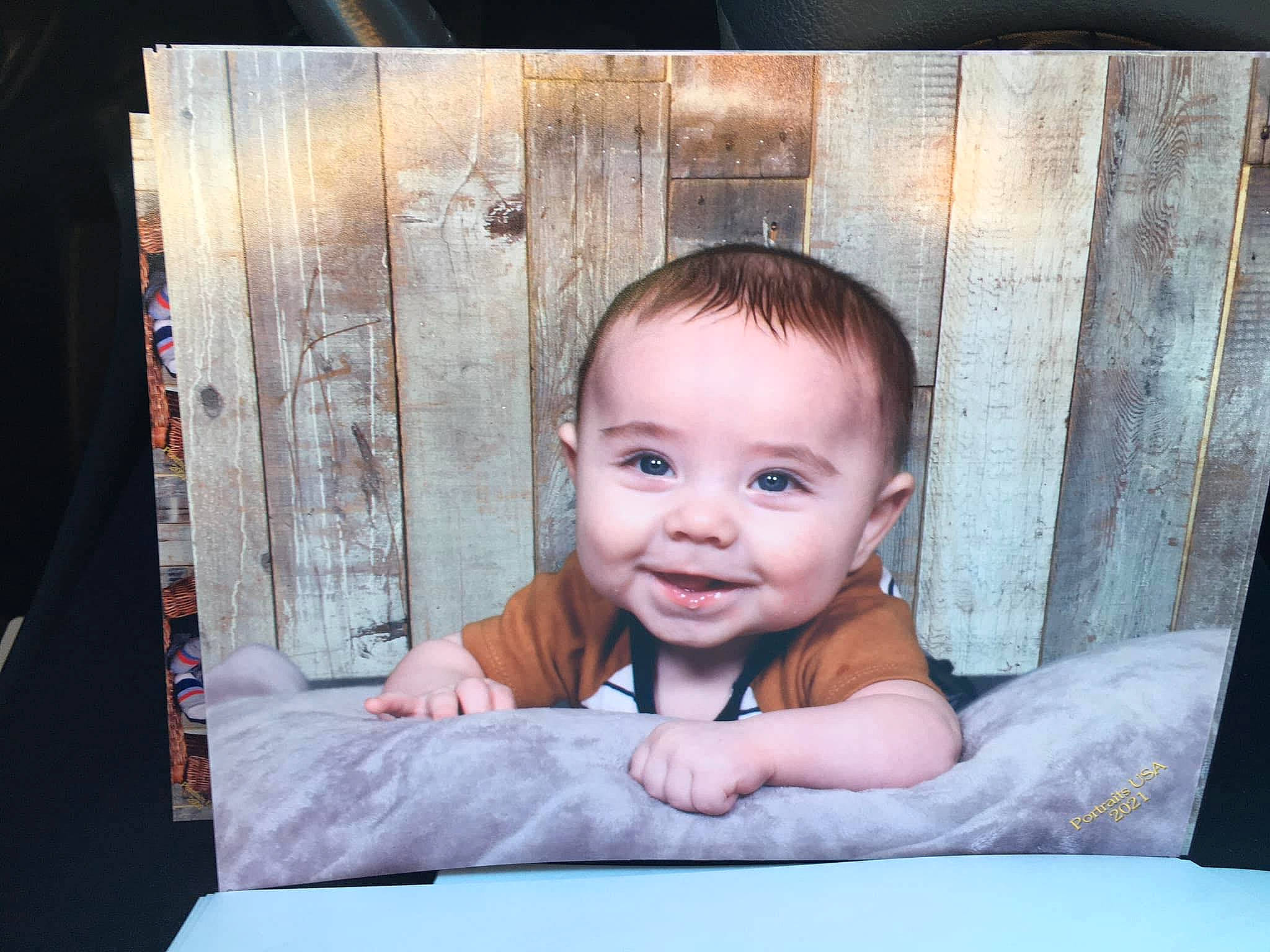 Austyn is registered to the contest to win money with this photo: art, baby, baby_toddler_clothing, beauty, cheek, child, comfort, eyelash, flash_photography, fun, happy, iris, joy, person, picture_frame, rectangle, room, sitting, smile, toddler