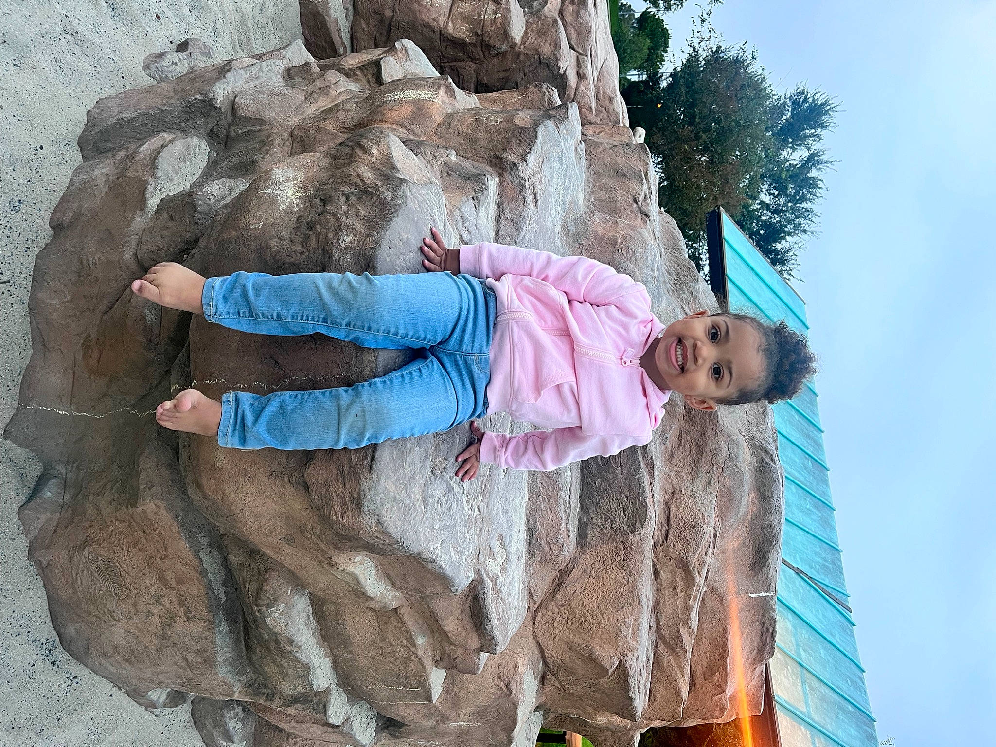 Sienna is registered to the contest to win money with this photo: adventure, child, fun, happy, joy, landscape, leisure, person, plant, recreation, rock, sky, toddler, tourism, travel, tree, vacation, wood