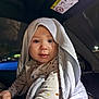 baby, child, blanket, car, interior, night, face, portrait, clothing, cute, infant, person, sitting, window, seat, expression, hood, light, young, indoors