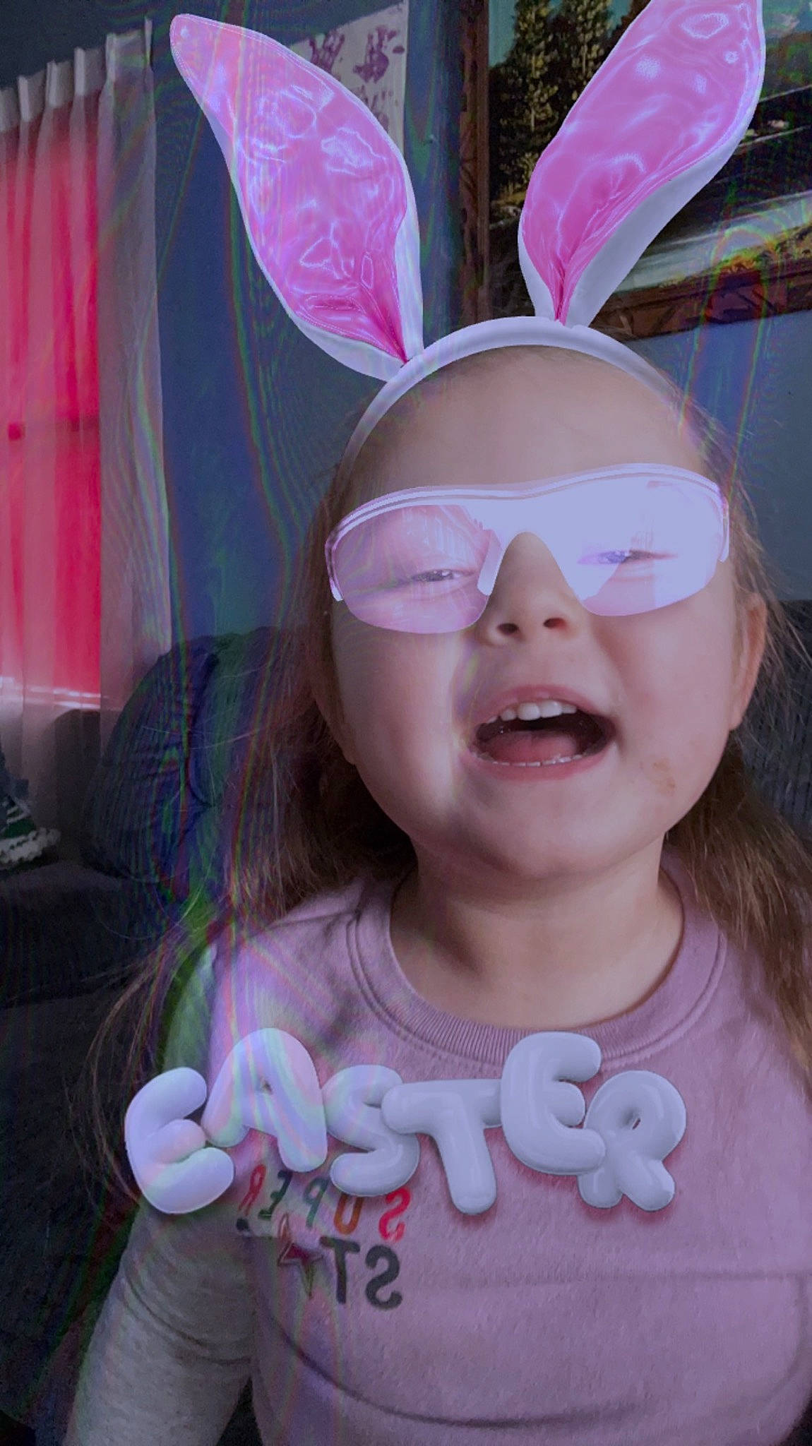 Lilia is registered to the contest to win money with this photo: cheek, child, chin, curtain, ear, eyebrow, eyelash, eyewear, facial_expression, fun, happy, lip, magenta, mouth, nose, person, pink, skin, smile, toddler