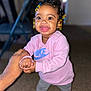 adult_hand, carpet, child, clothing, colorful_beads, cute, hair, happy, holding_hands, indoor, joyful, nike, person, portrait, shoes, smiling, standing, sweatshirt, toddler, young_child