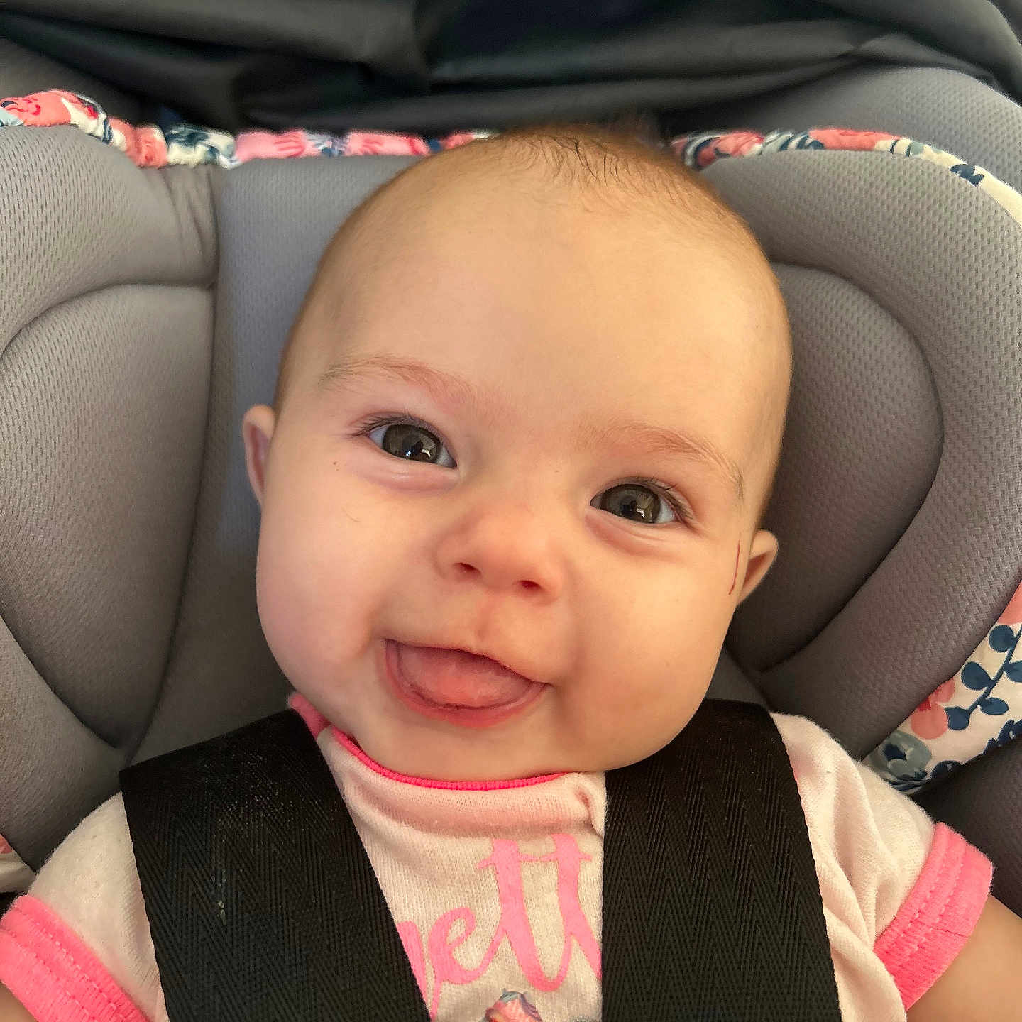 Everleigh joined the competition — help win amazing prizes! accessories, baby, babylaughing, belt, bodypart, clothing, coat, cushion, face, happy, head, homedecor, jacket, laughing, mouth, person, photography, portrait, smile, strap