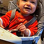 toddler, child, high_chair, red_clothing, messy, smiling, indoor, baby, seatbelt, feeding_time, happy, face, hand, table, food_crumbs, straps, hair, cute, portrait, young_child