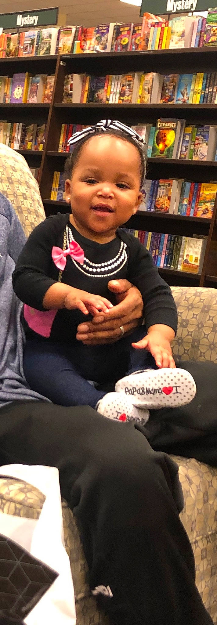 Ava Marie is registered to the contest to win money with this photo: arm, baby, child, footwear, leg, person, play, shoe, sitting, toddler