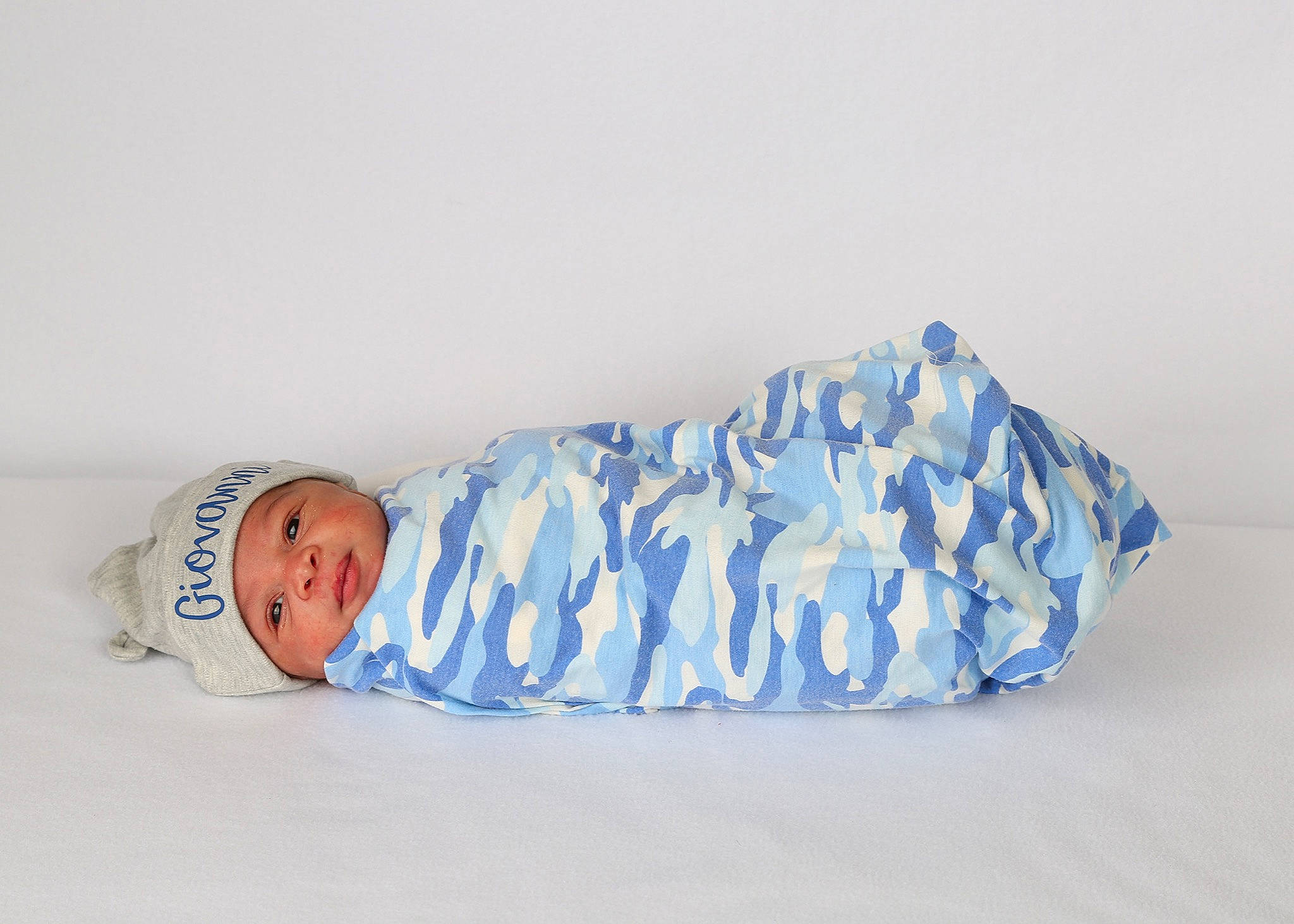 Gio joined the competition — help win amazing prizes! baby, baby_products, baby_toddler_clothing, child, comfort, electric_blue, fashion_accessory, headgear, headwear, human_body, linens, pattern, person, portrait_photography, sitting, sleeve, smile, toddler