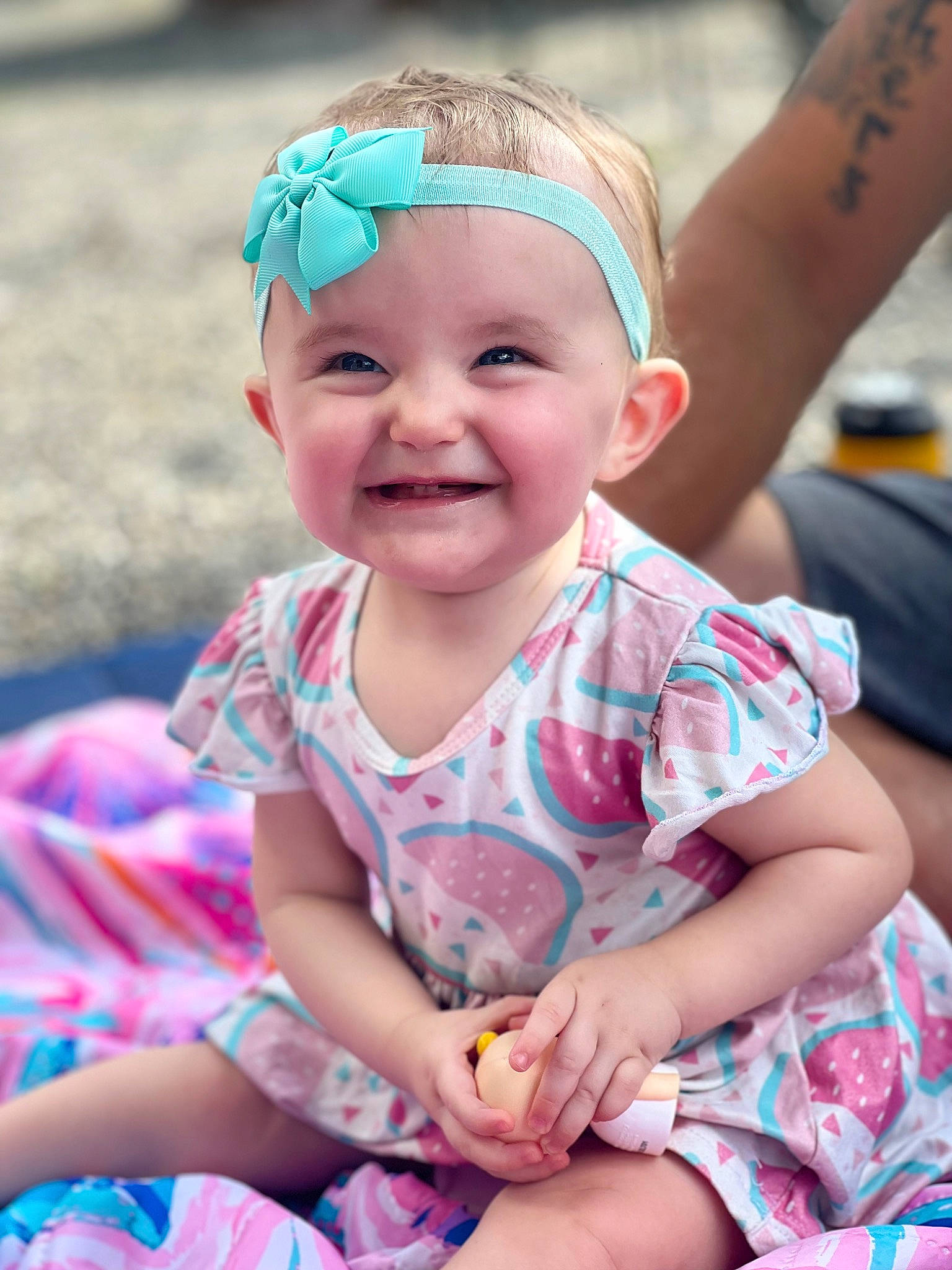 Illiana is registered to the contest to win money with this photo: baby, baby_toddler_clothing, beauty, child, face, facial_expression, finger, fun, grass, happy, head, headband, headgear, headwear, joy, leisure, person, pink, recreation, skin