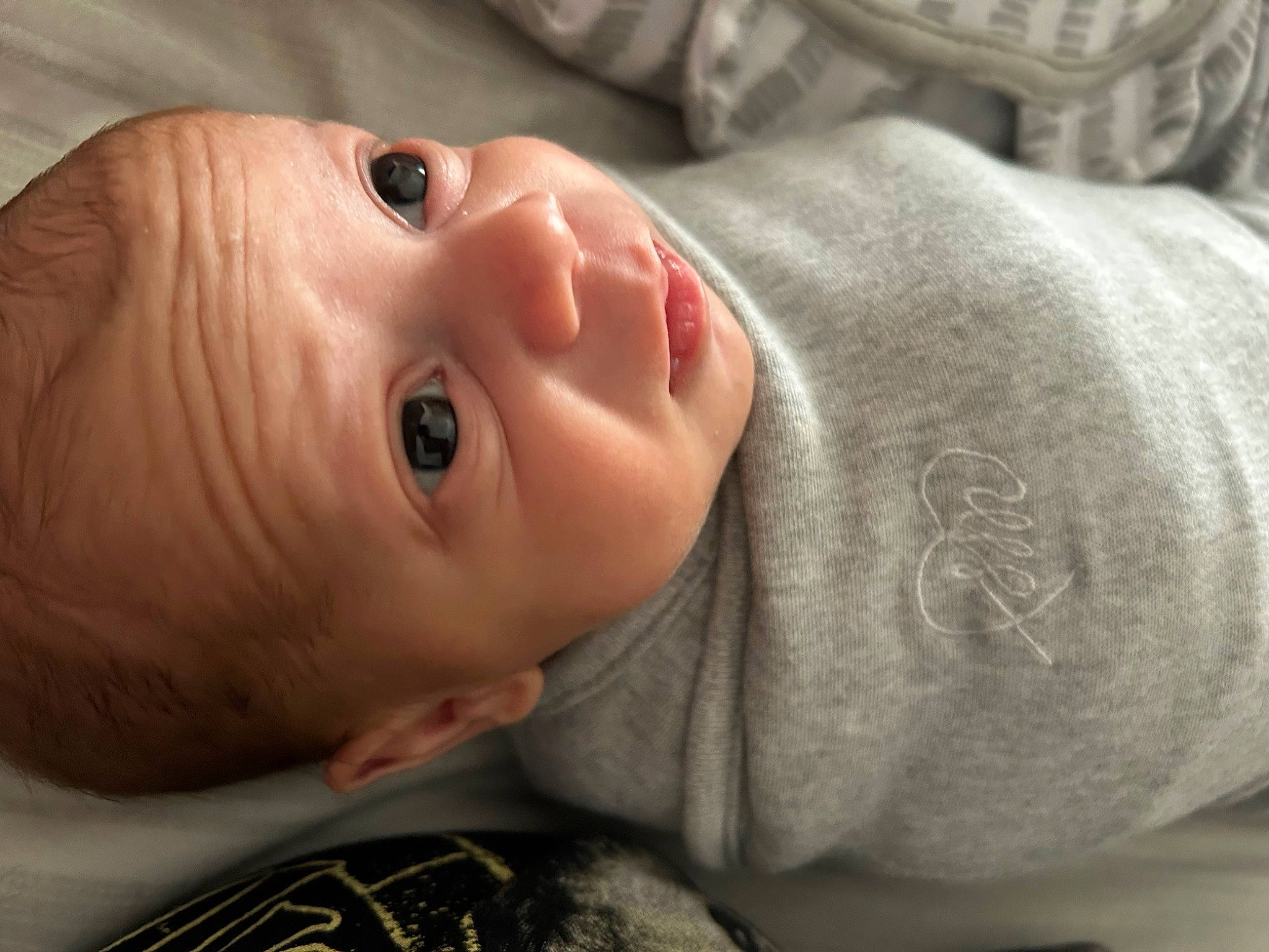 Brantley is registered to the contest to win money with this photo: baby, baby_toddler_clothing, cheek, child, chin, close_up, eye, eyebrow, eyelash, flash_photography, happy, iris, lip, mouth, nose, person, skin, sleeve, smile, toddler