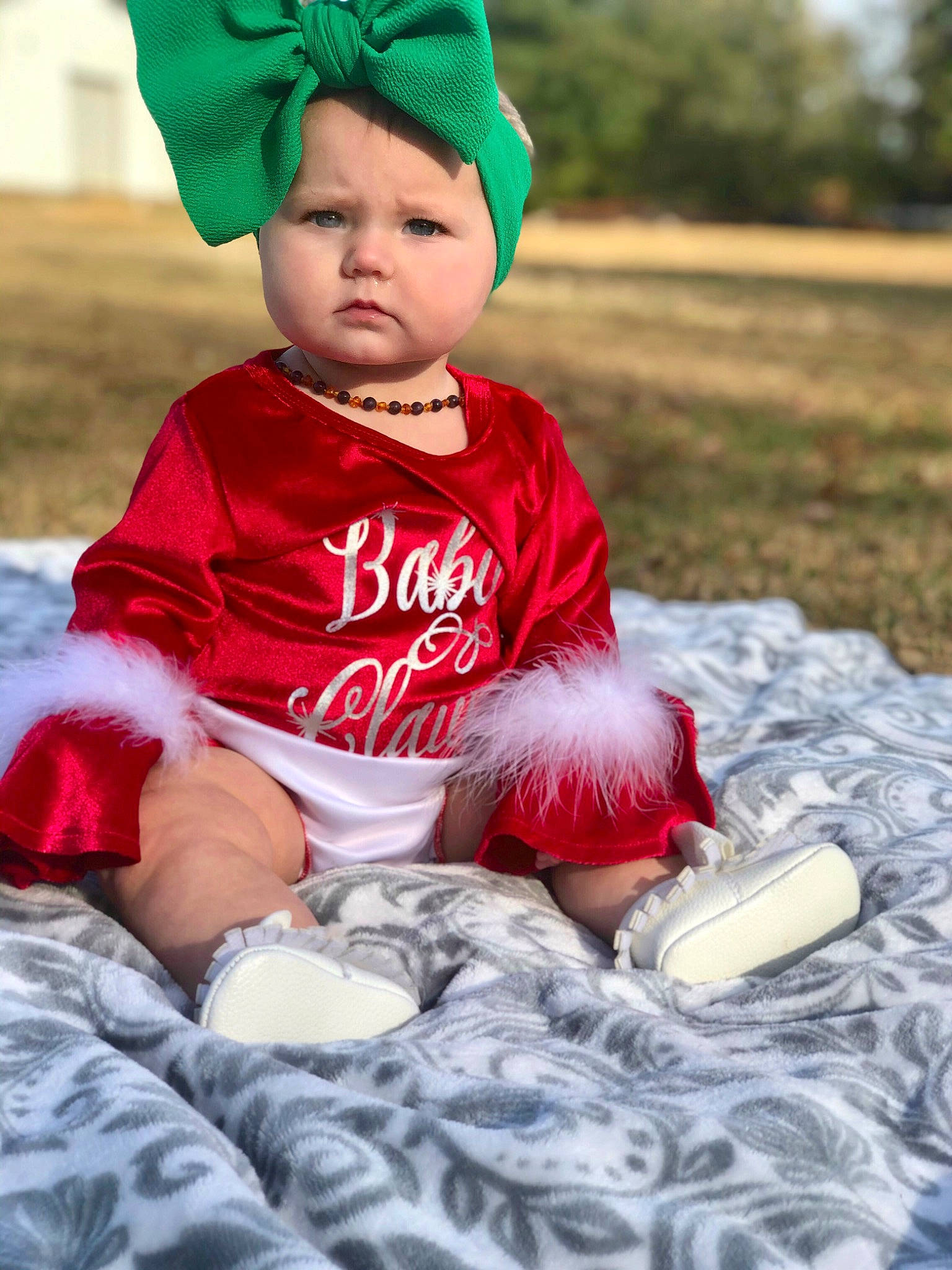 Adaleigh is registered to the contest to win money with this photo: baby, baby_toddler_clothing, bonnet, child, costume, fun, happy, headgear, person, play, red, sitting, smile, sorrow, toddler
