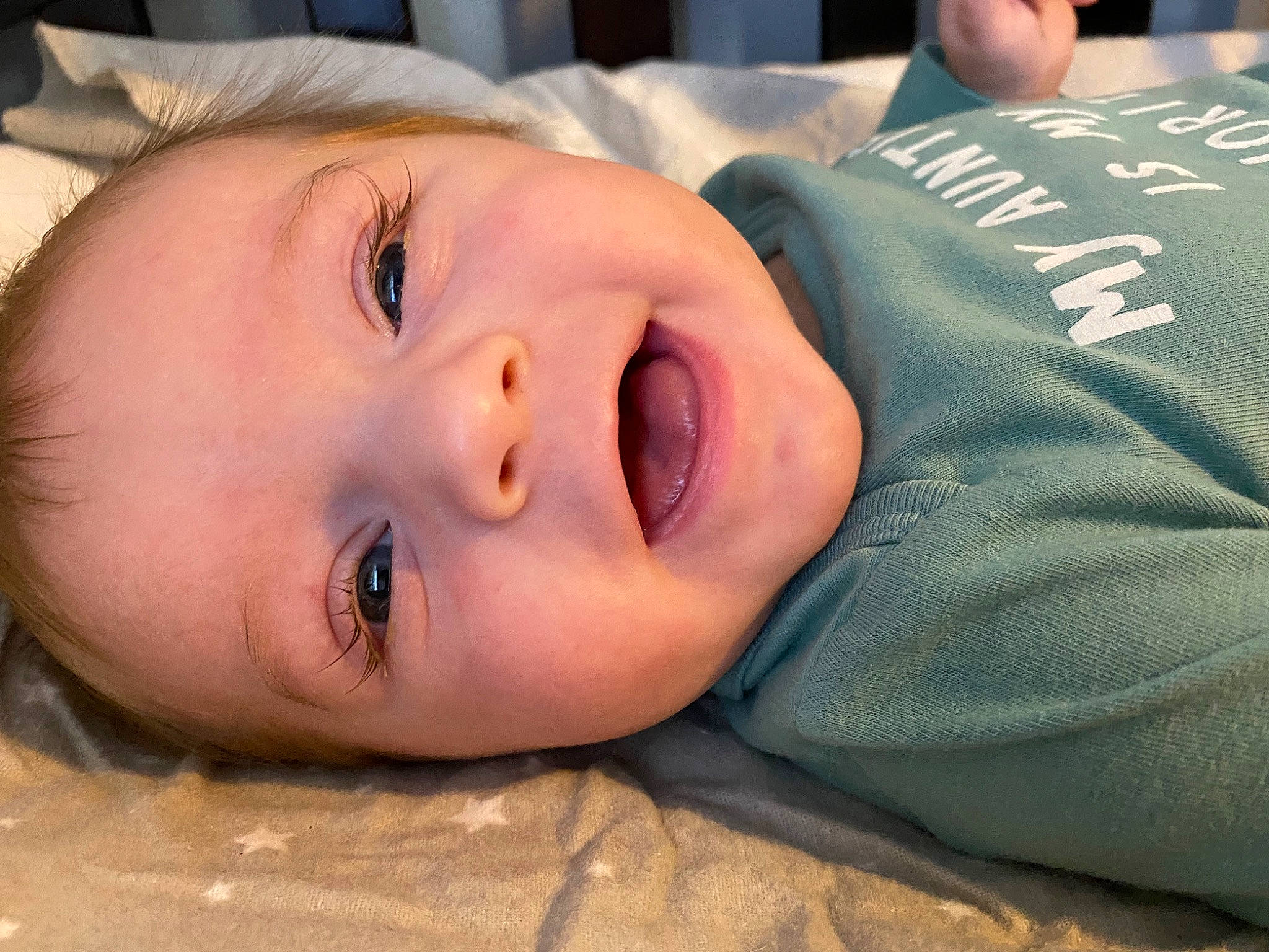 Julian is registered to the contest to win money with this photo: baby, baby_toddler_clothing, cheek, child, chin, comfort, eyebrow, eyelash, fun, grass, happy, lip, mouth, nose, person, portrait_photography, sitting, skin, sleeve, toddler