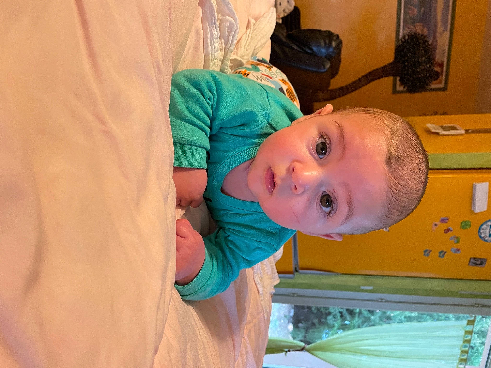 Esteban participe au concours pour gagner de l'argent avec cette photo : arm, baby, baby_toddler_clothing, cheek, child, comfort, elbow, electric_blue, eye, happy, hat, human_body, iris, mouth, nose, person, picture_frame, smile, surprise, t_shirt