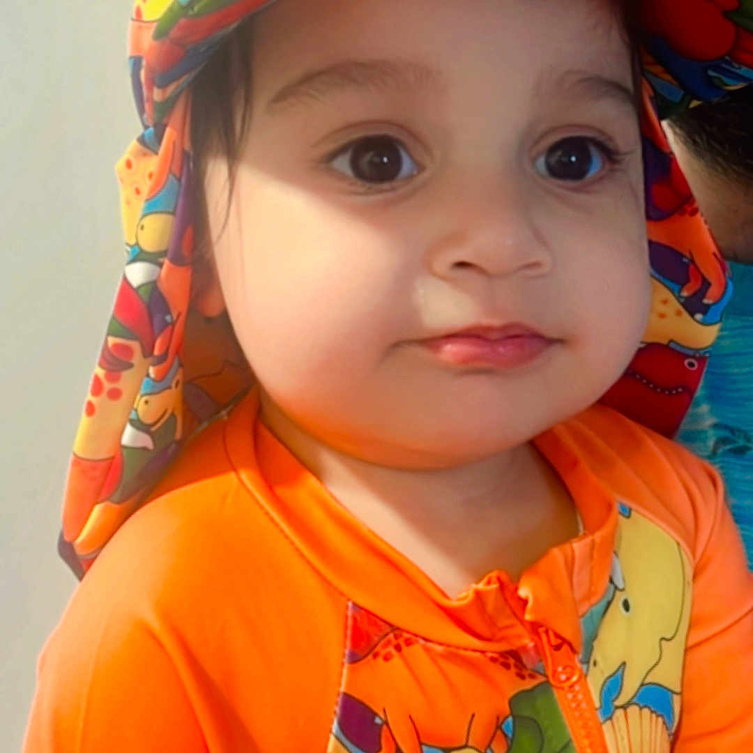 Alrik joined the competition — help win amazing prizes! baby, casual, child, childhood, colorful_clothing, cute, dinosaur_pattern, expression, eyes, face, hat, headwear, human, indoor, orange_outfit, person, portrait, skin, toddler, young_child