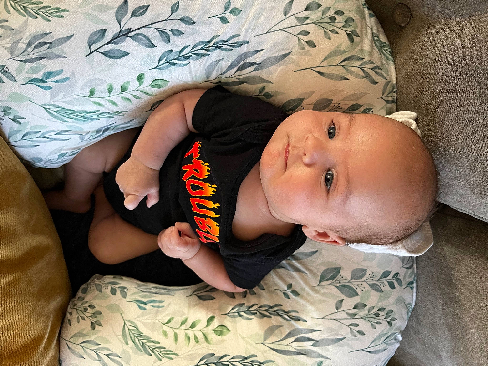 Frankie is registered to the contest to win money with this photo: abdomen, baby, baby_toddler_clothing, bed, child, comfort, elbow, eye, human_body, linens, mouth, pattern, person, room, skin, sleeve, textile, thigh, toddler, trunk