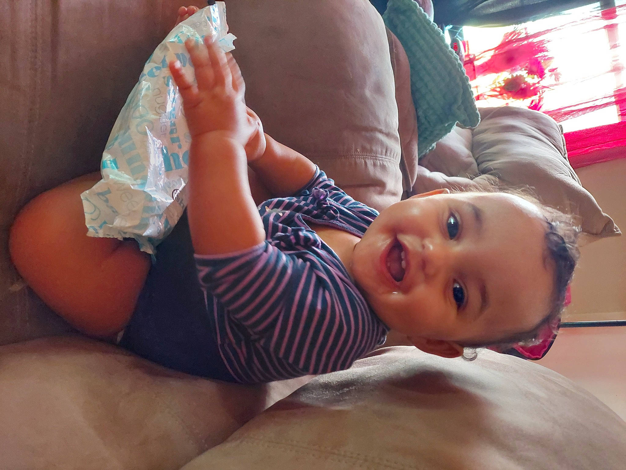 Gianna is registered to the contest to win money with this photo: baby, child, comfort, eye, facial_expression, hairstyle, happy, human, human_body, joint, leg, lip, mammal, mouth, muscle, neck, person, skin, smile, thigh