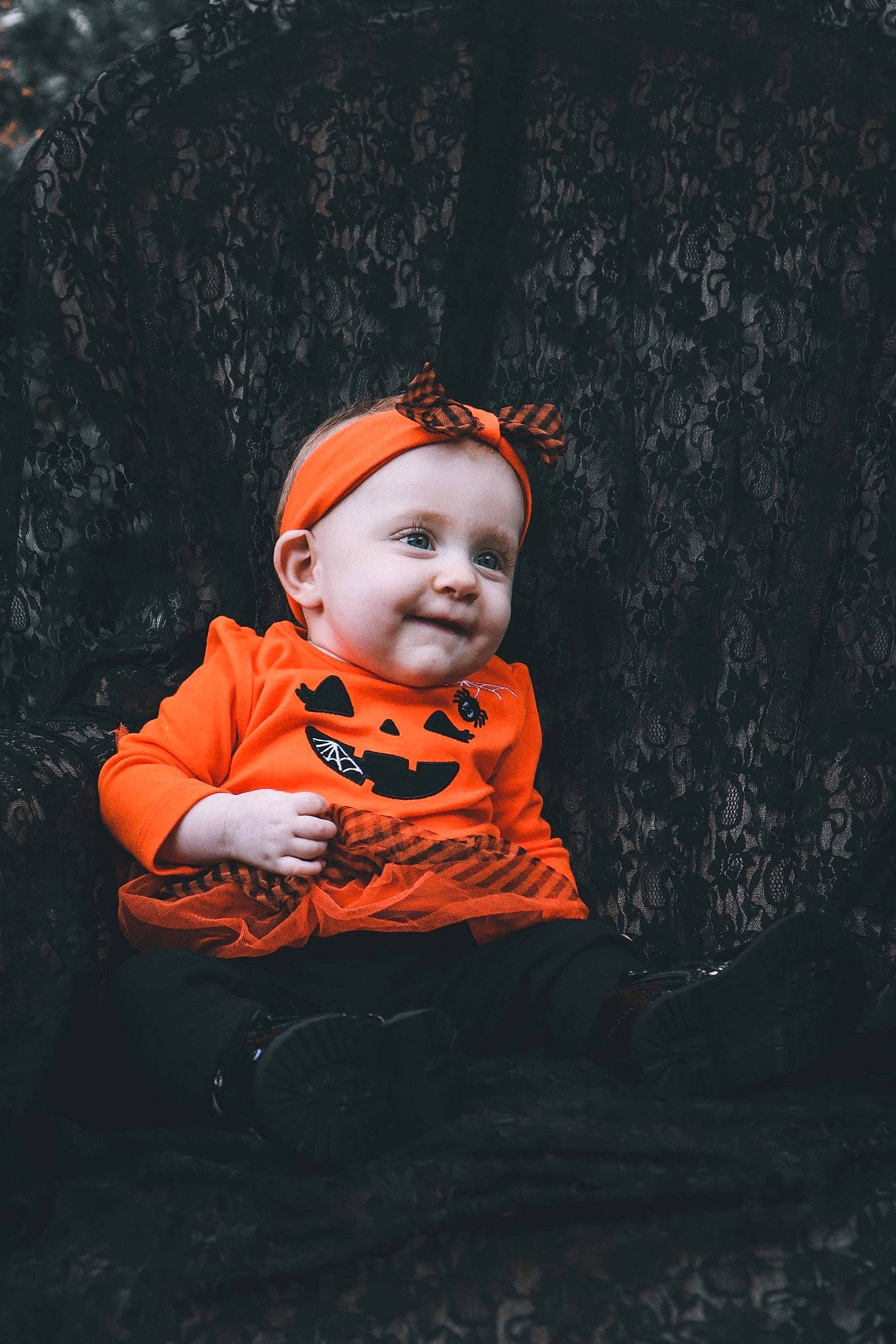 Avyanna is registered to the contest to win money with this photo: art, autumn, baby, baby_toddler_clothing, child, darkness, flash_photography, fun, grass, happy, headwear, joy, person, personal_protective_equipment, plant, portrait, portrait_photography, sitting, smile, toddler