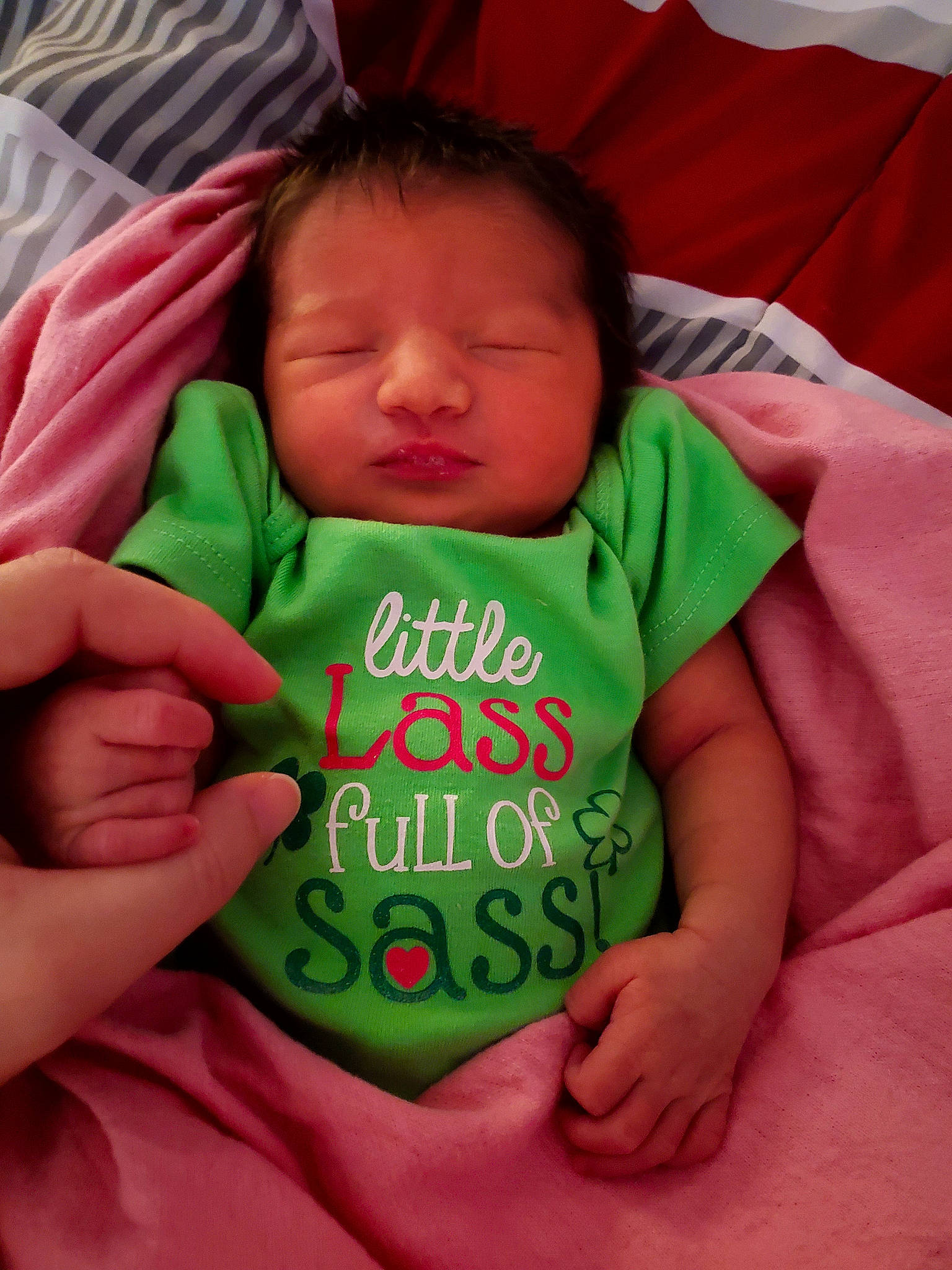 Yolanda is registered to the contest to win money with this photo: baby, baby_sleeping, baby_toddler_clothing, cheek, chin, comfort, face, finger, gesture, happy, head, human_body, linens, mouth, nose, person, skin, sleeve, textile, thumb