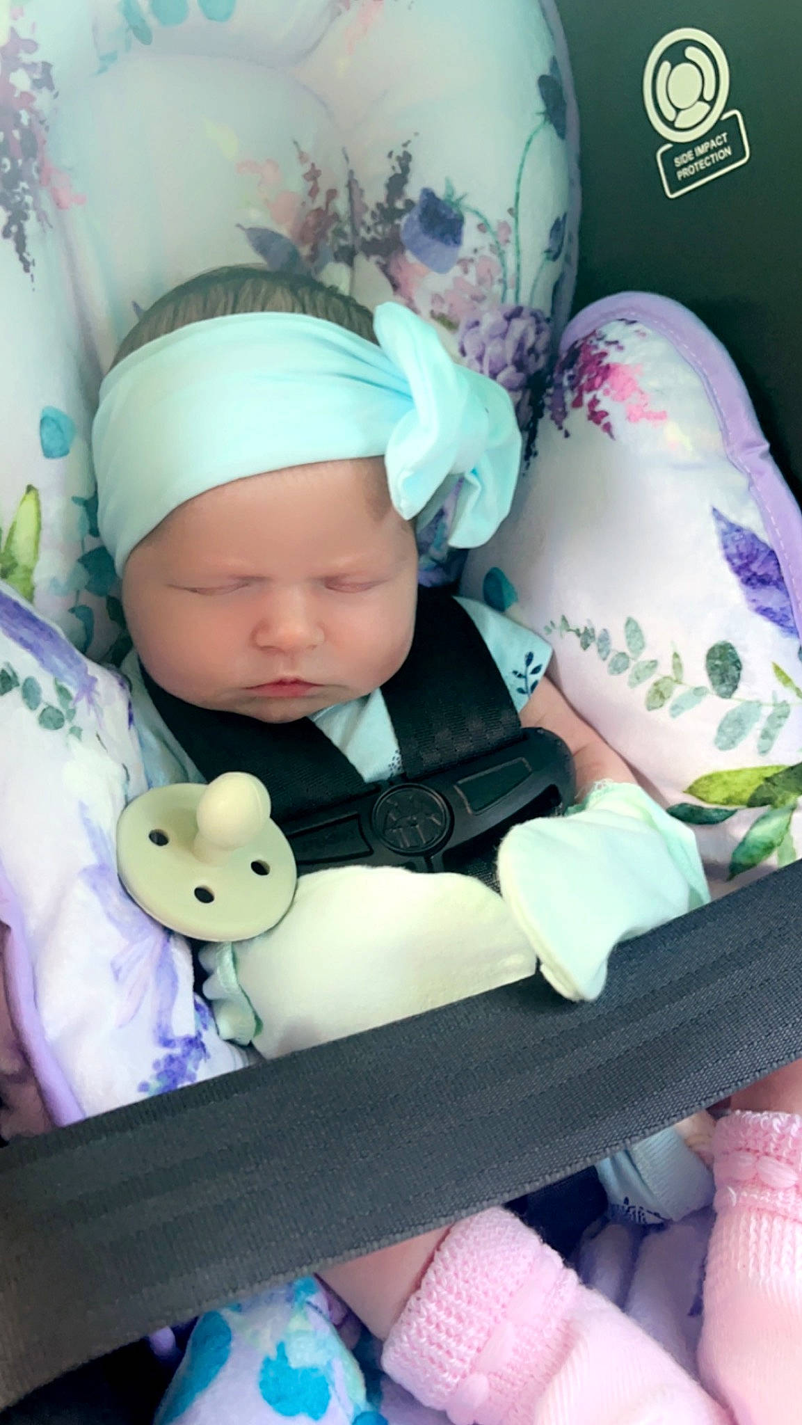 Brooklynn joined the competition — help win amazing prizes! baby, baby_products, baby_toddler_clothing, beanie, cap, child, comfort, costume_hat, fashion_accessory, hat, headgear, headwear, linens, pattern, person, pink, purple, room, sitting, stuffed_toy