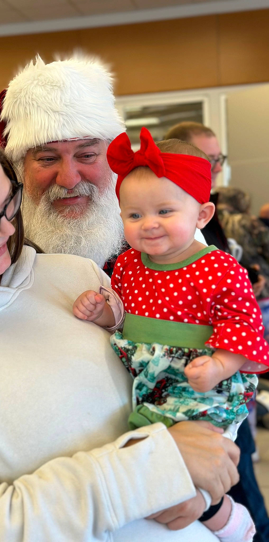 Paisley joined the competition — help win amazing prizes! baby, baby_toddler_clothing, beard, child, christmas, costume_hat, event, facial_expression, facial_hair, fun, happy, hat, headgear, headwear, holiday, joy, lap, pattern, person, skin