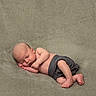 baby, sleeping, infant, blanket, soft_texture, cozy, peaceful, wrapped, newborn, skin, barefoot, resting, child, cute, portrait, lying_down, indoor, comfort, relaxation, small
