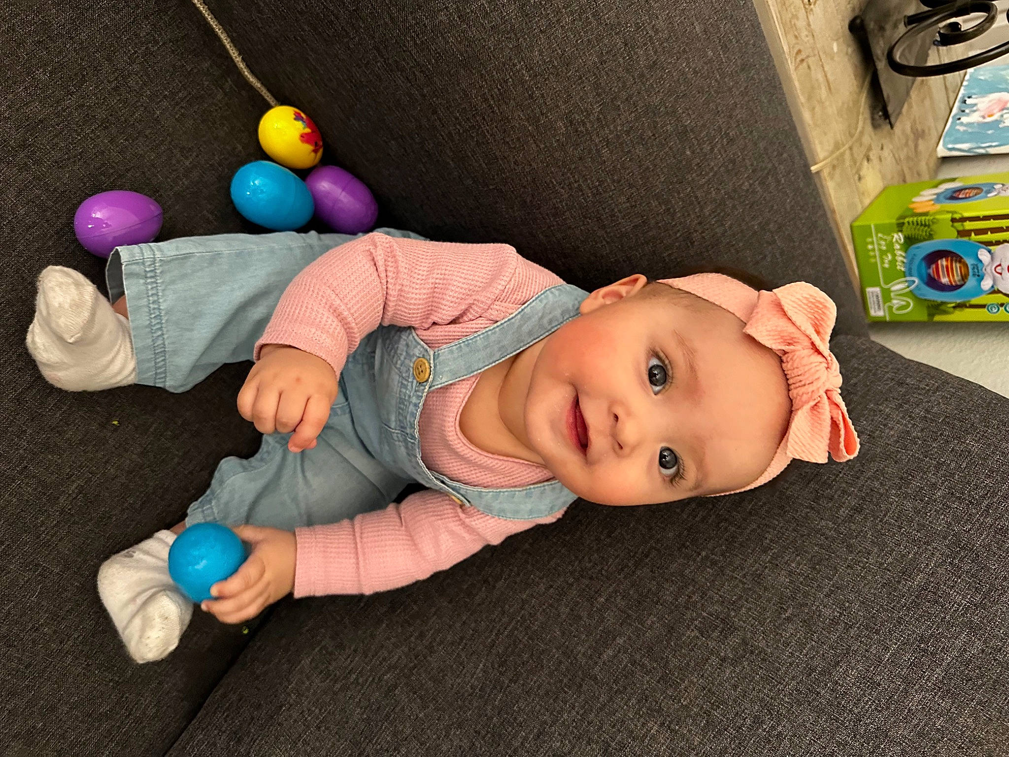 Liliana is registered to the contest to win money with this photo: arm, baby, baby_products, baby_toddler_clothing, baby_toys, cheek, child, finger, fun, hand, headwear, human_body, joint, leg, person, product, room, skin, thumb, toddler
