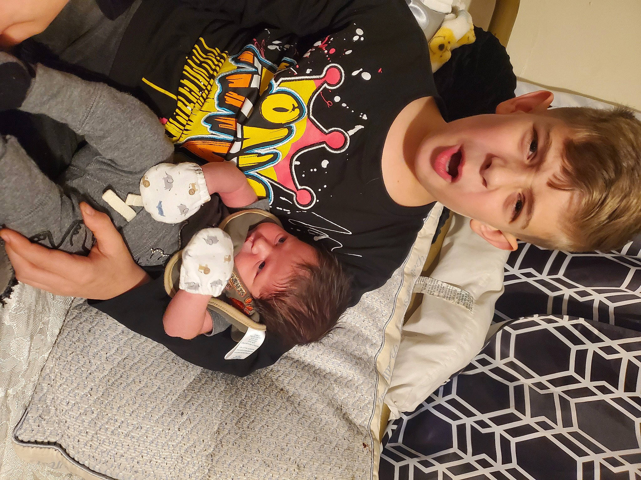 Erich joined the competition — help win amazing prizes! anger, baby, baby_toddler_clothing, child, comfort, cool, event, fun, happy, interaction, lap, mammal, pattern, person, plaid, product, room, sleeve, smile, t_shirt