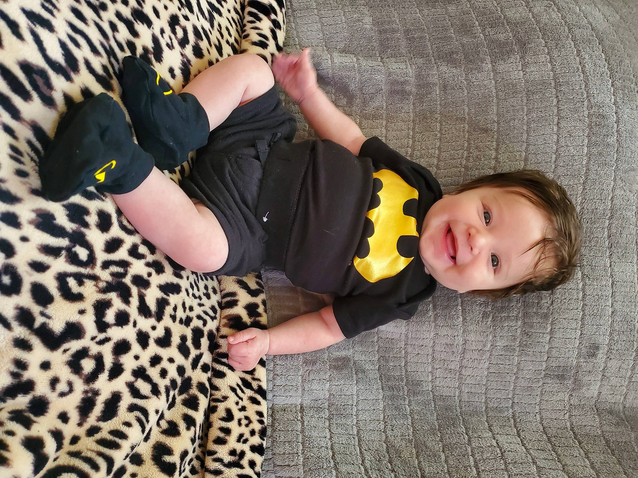 Karsyn is registered to the contest to win money with this photo: baby_toddler_clothing, beauty, child, comfort, flooring, fun, grass, human_leg, joy, knee, outerwear, pattern, person, sitting, sleeve, smile, textile, thigh, toddler, tree