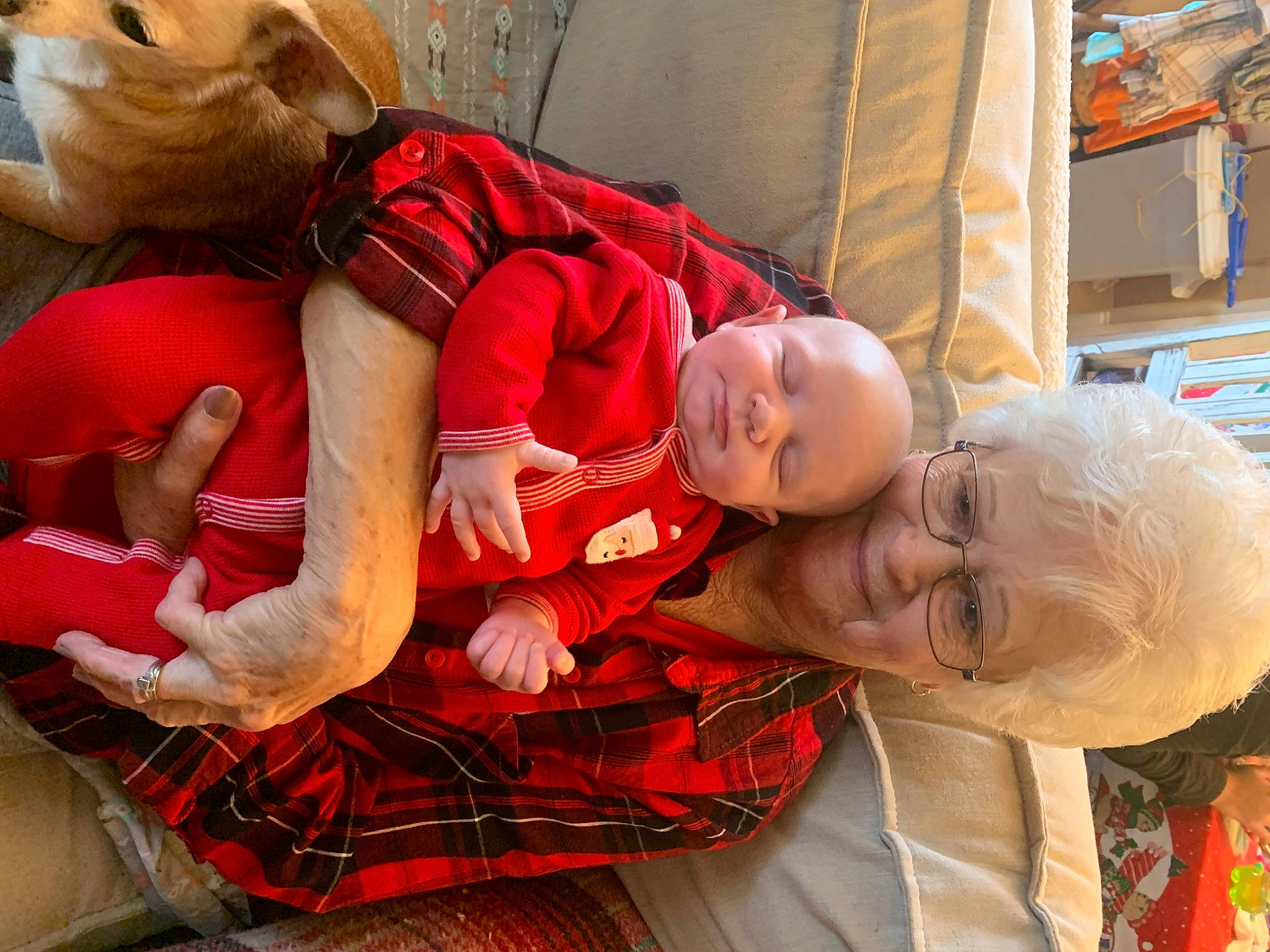 Oliver joined the competition — help win amazing prizes! baby, child, christmas_eve, comfort, event, fun, happy, holiday, joy, lap, orange, pattern, person, plaid, room, sitting, smile, tartan, toddler, tradition