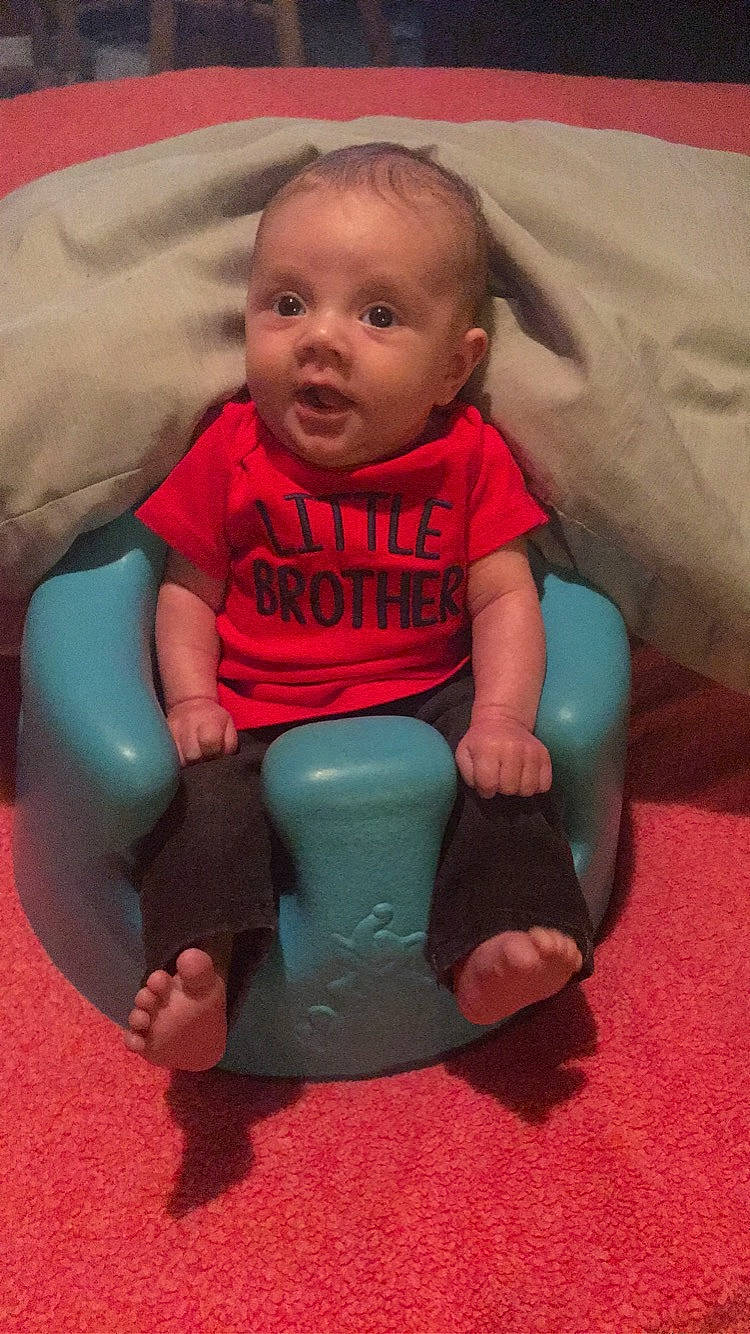 Axl is registered to the contest to win money with this photo: baby, cheek, child, mouth, person, play, sitting, skin, smile, surprise, toddler