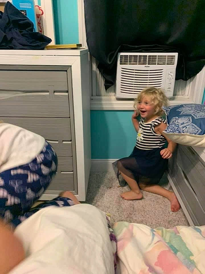 Taylor joined the competition — help win amazing prizes! blue, cabinetry, chest_of_drawers, child, closet, comfort, cupboard, drawer, flooring, human_leg, joint, knee, leisure, linens, person, room, shorts, sitting, t_shirt, thigh