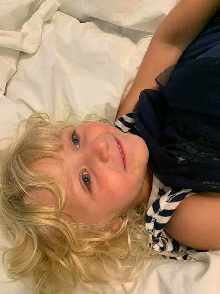 Taylor is registered to the contest to win money with this photo: abdomen, cheek, chest, child, comfort, elbow, eyelash, flooring, fun, gesture, happy, iris, joy, nose, person, room, sitting, smile, toddler, wood